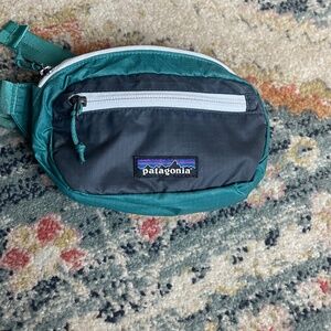 Patagonia Turquoise and Charcoal Ultralight Black Hole Mini Hip Pack